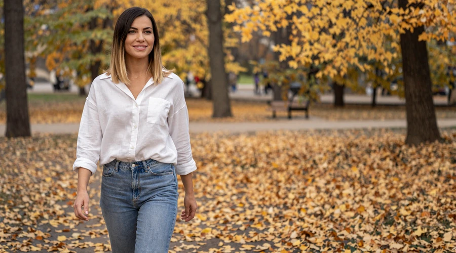 Slavic woman walking through an autumn park - meet real Eastern European women on Datingservisebest